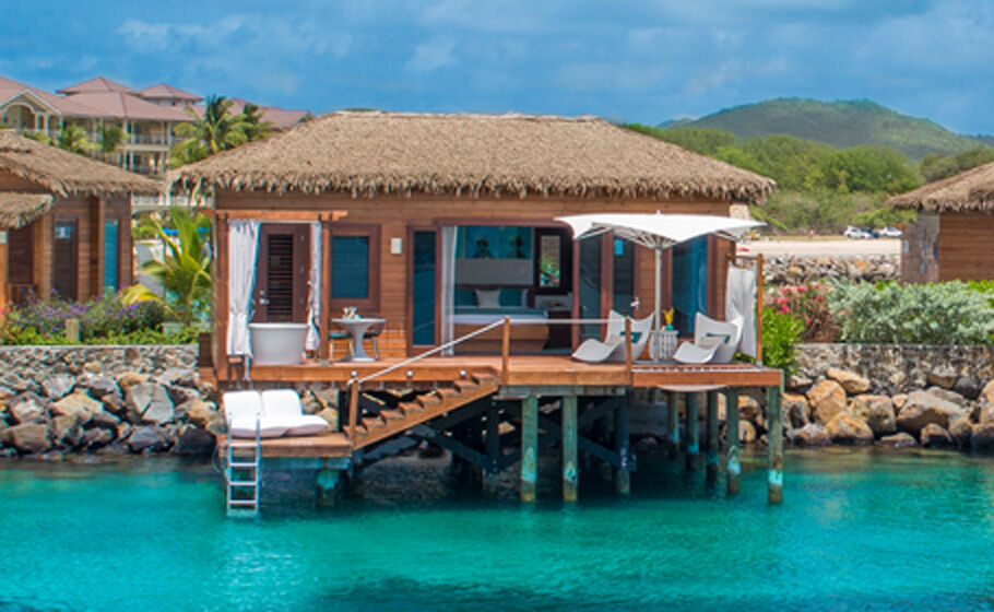 The Tahiti-style bungalows in St. Lucia. Make sure you have a waterproof phone or covering so you can get pictures like these to share with us! Photo courtesy of Sandals
