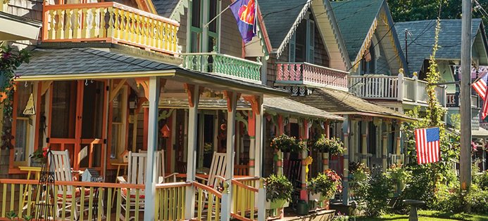 Colorful gingerbread cottages with hanging flower baskets on Martha’s Vineyard