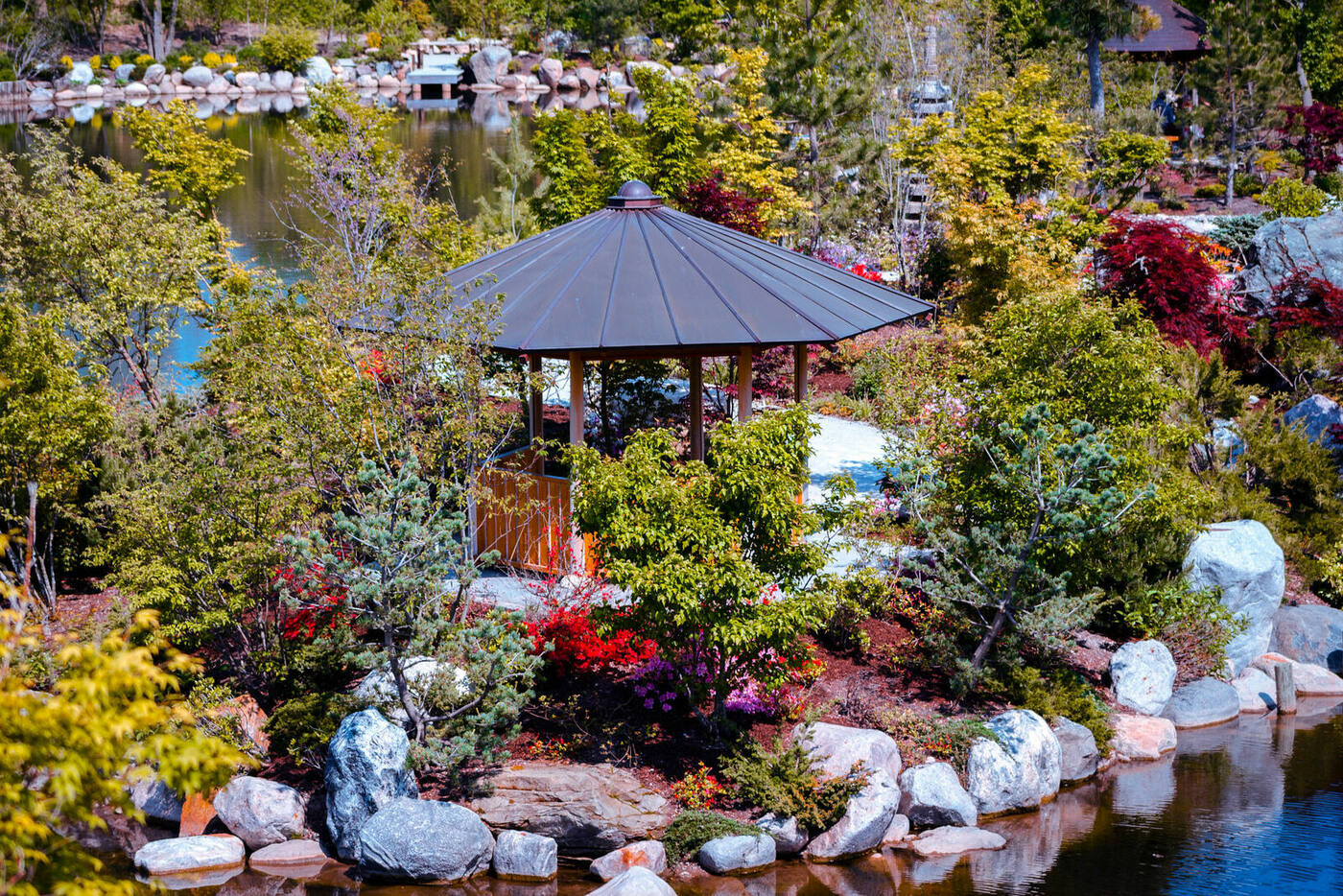 A garden pavilion surrounded by flowers in Grand Rapids