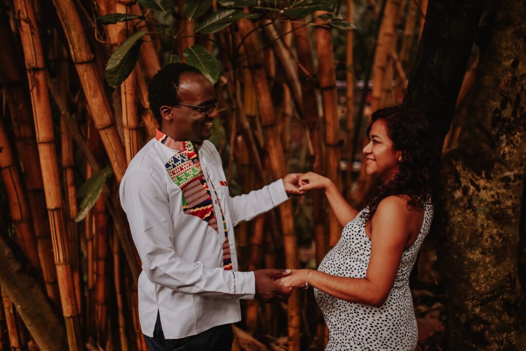 couple dancing together on a babymoon