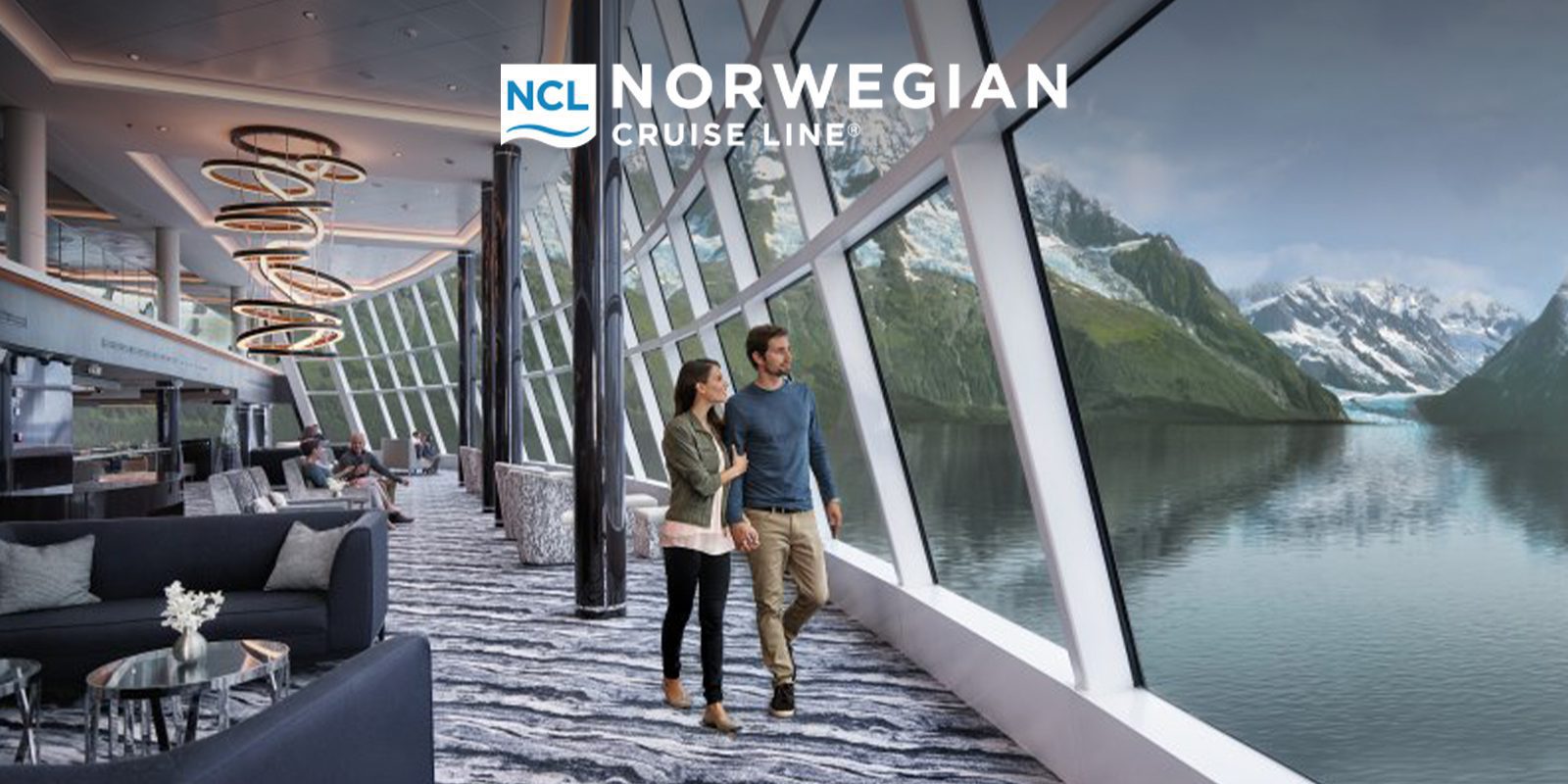 Passengers enjoying the serene views from the Observation Lounge aboard Norwegian Cruise Line in Alaska.